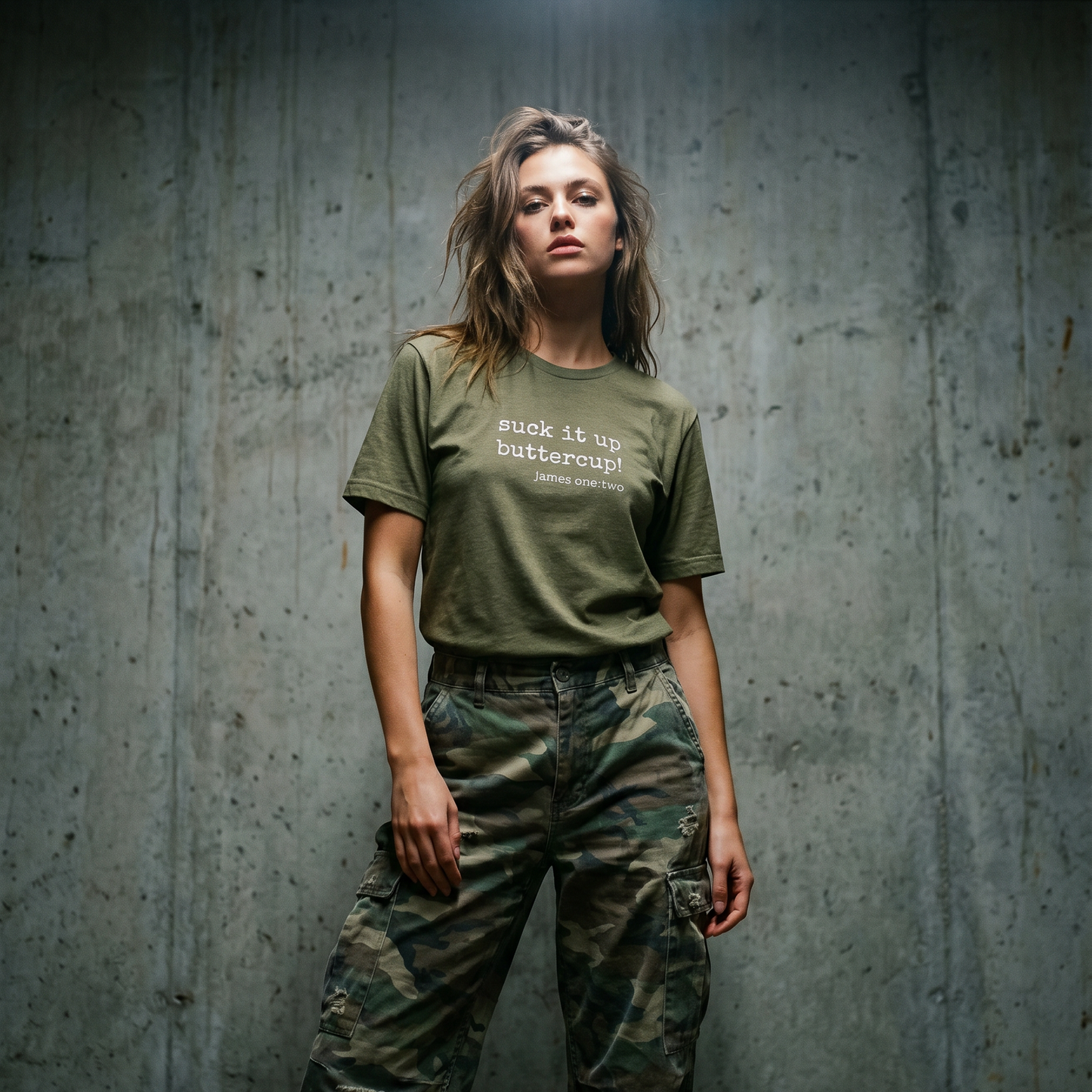 Person wearing an olive green t-shirt with text Suck It Up Buttercup!