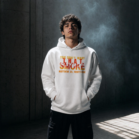 Model is wearing a white hoodie with a graphic print on the chest that reads 'YOU DON'T WANT THAT SMOKE MATTHEW 25:41' in yellow and orange flame-style lettering, posed against a dark studio background.