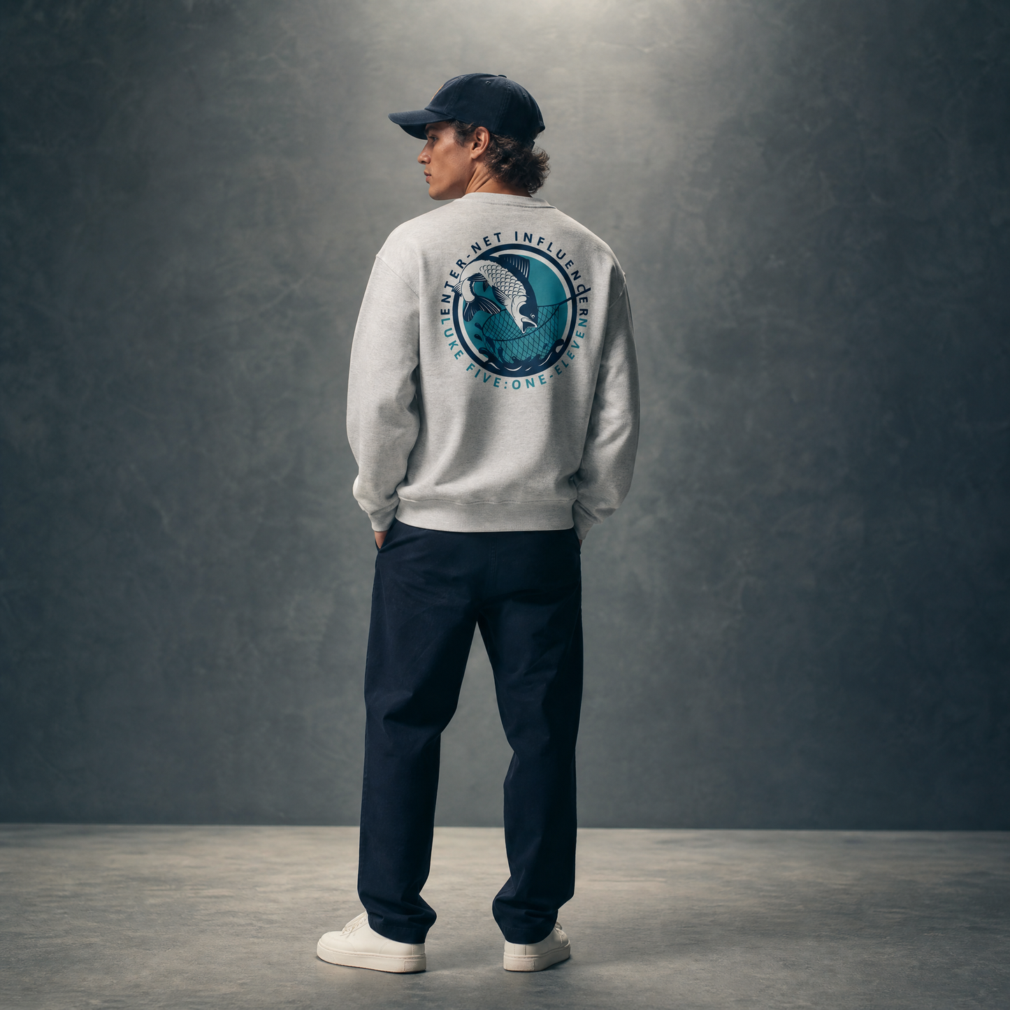 Person wearing an Enter-Net Influencer ash sweatshirt with a back design