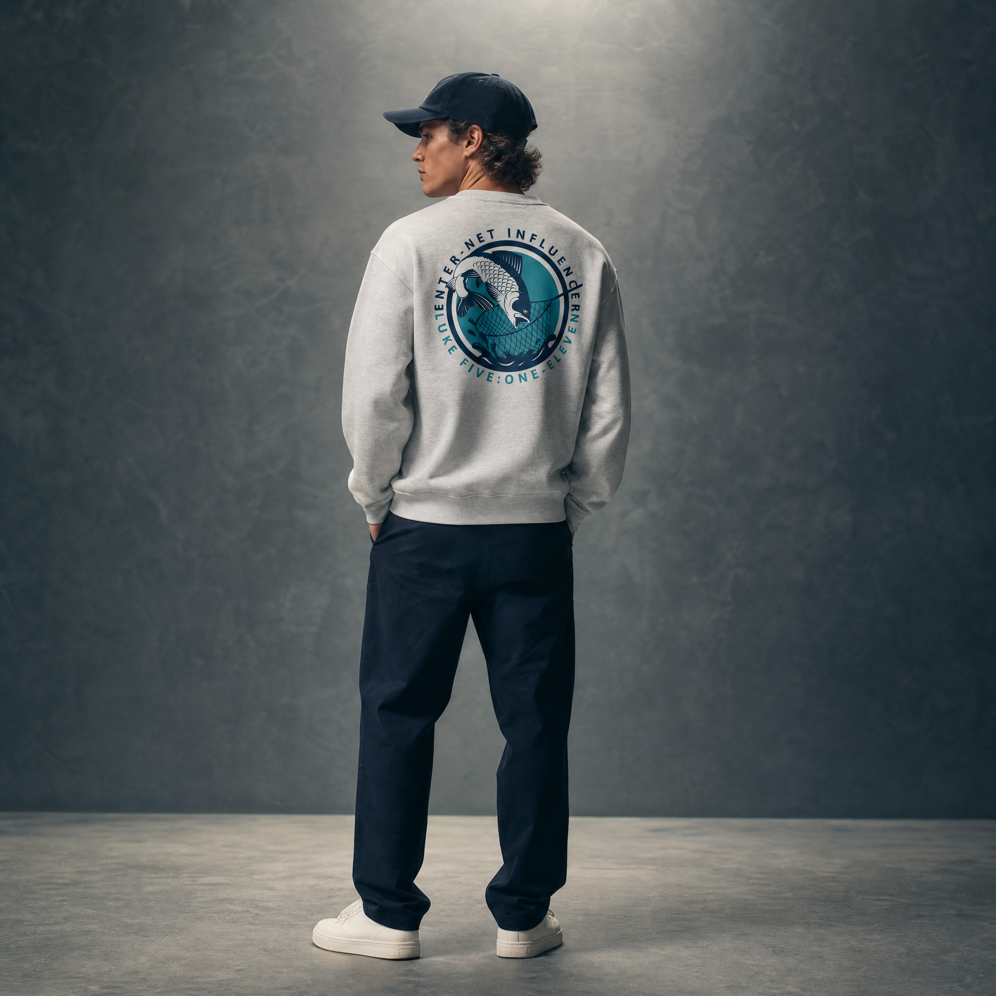 Person wearing an Enter-Net Influencer ash sweatshirt with a back design