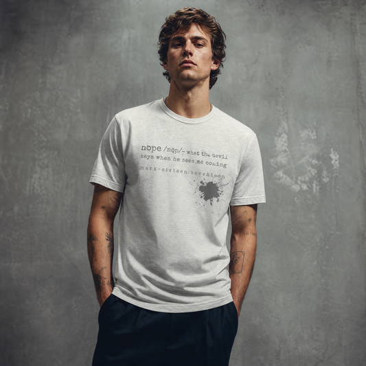Man wearing a white t-shirt with text and splatter design on a gray background