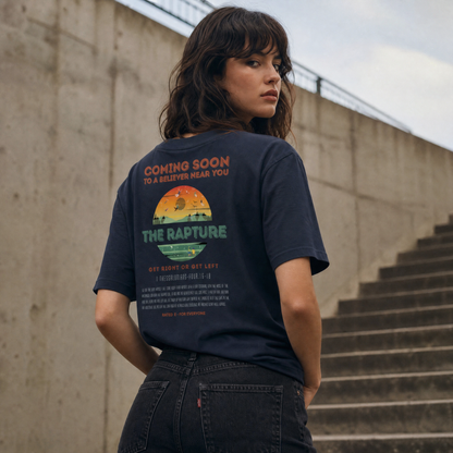 Person wearing a heather navy t-shirt with text and a back design 
