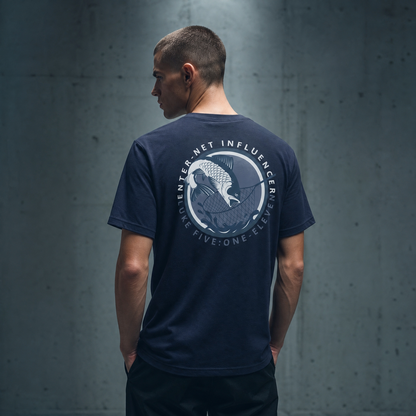 Person wearing an Enter-Net Influencer heather navy t-shirt with a back design