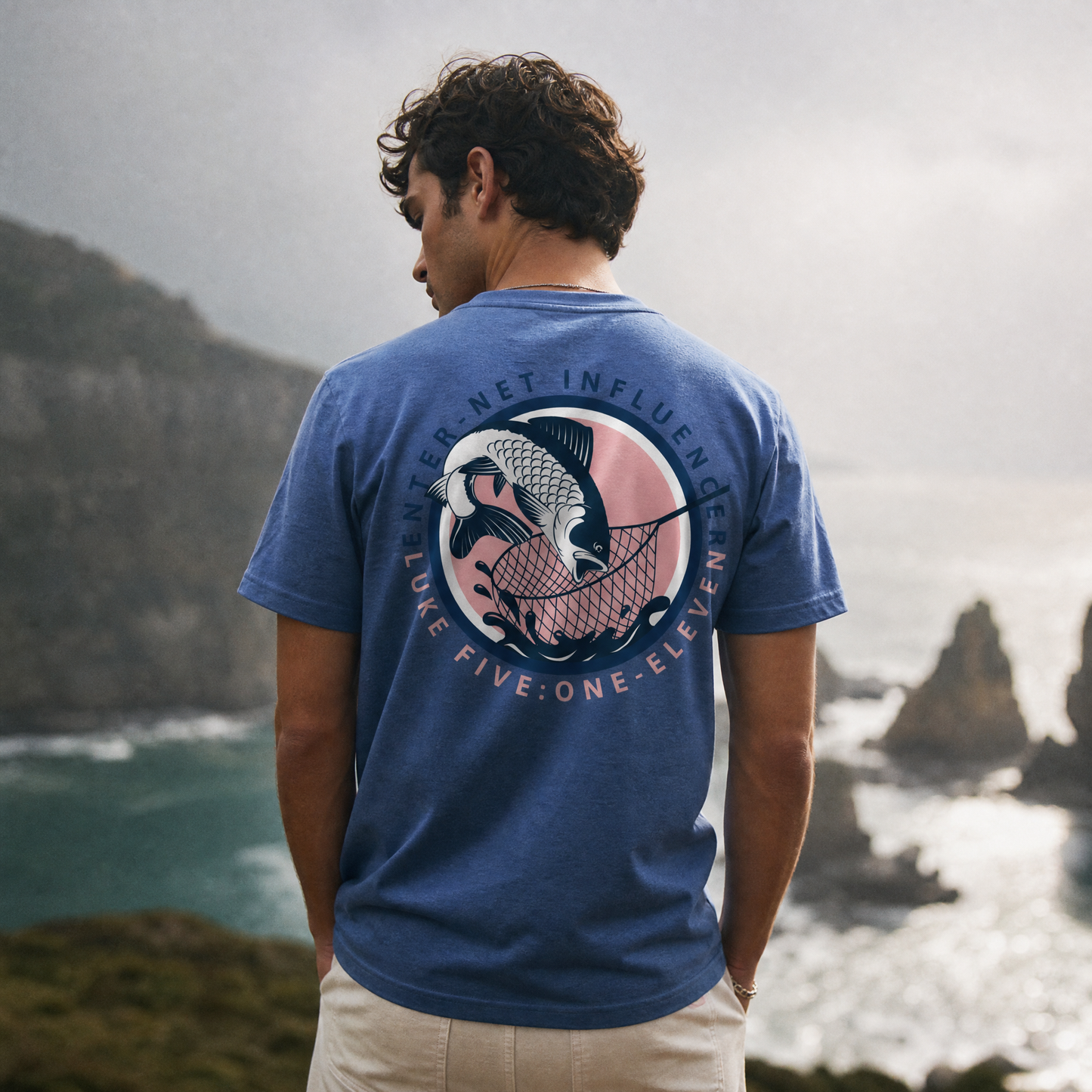 Person wearing an Enter-Net Influencer heather royal blue t-shirt with a back design