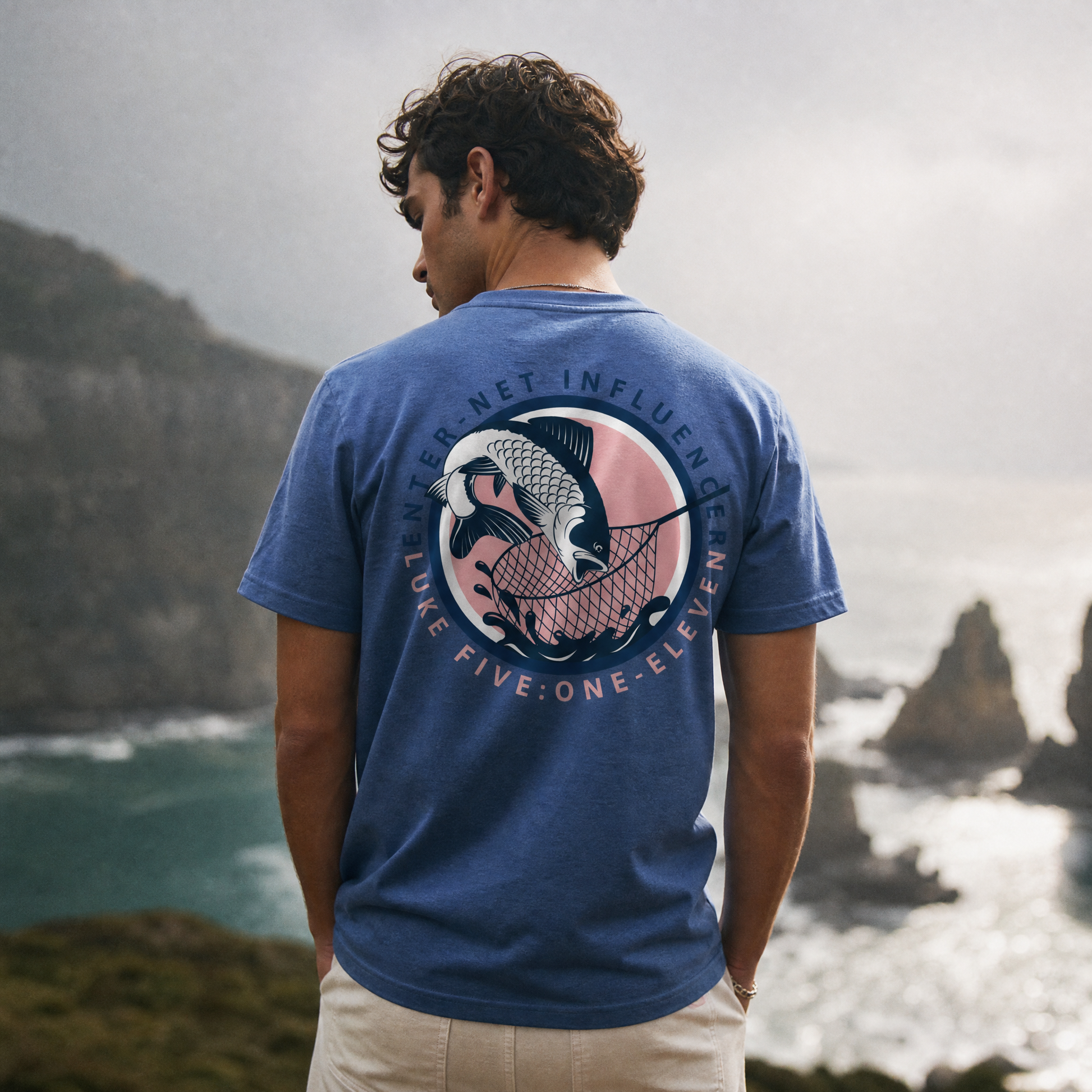 Person wearing an Enter-Net Influencer heather royal blue t-shirt with a back design
