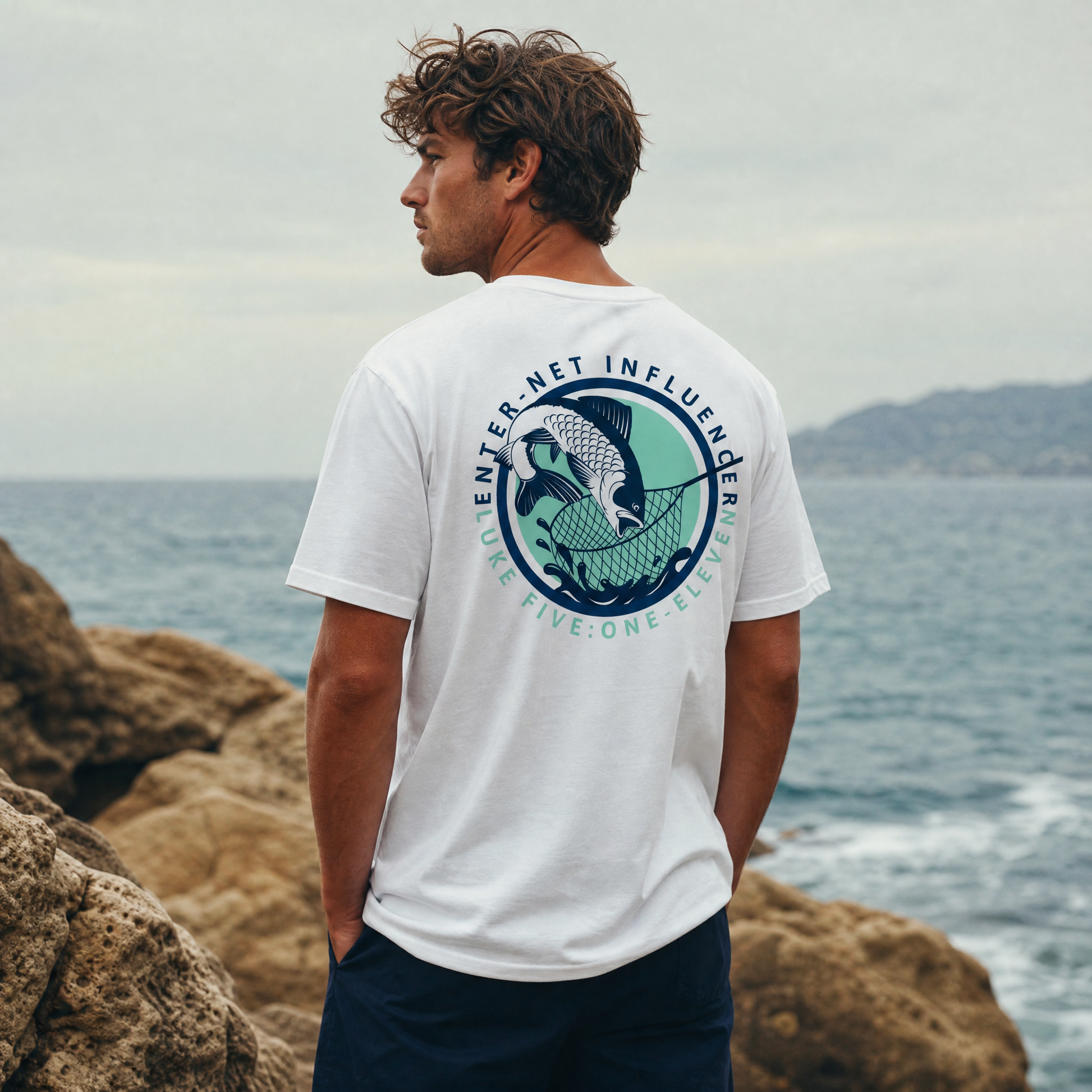 Person wearing an Enter-Net Influencer white t-shirt with a back design